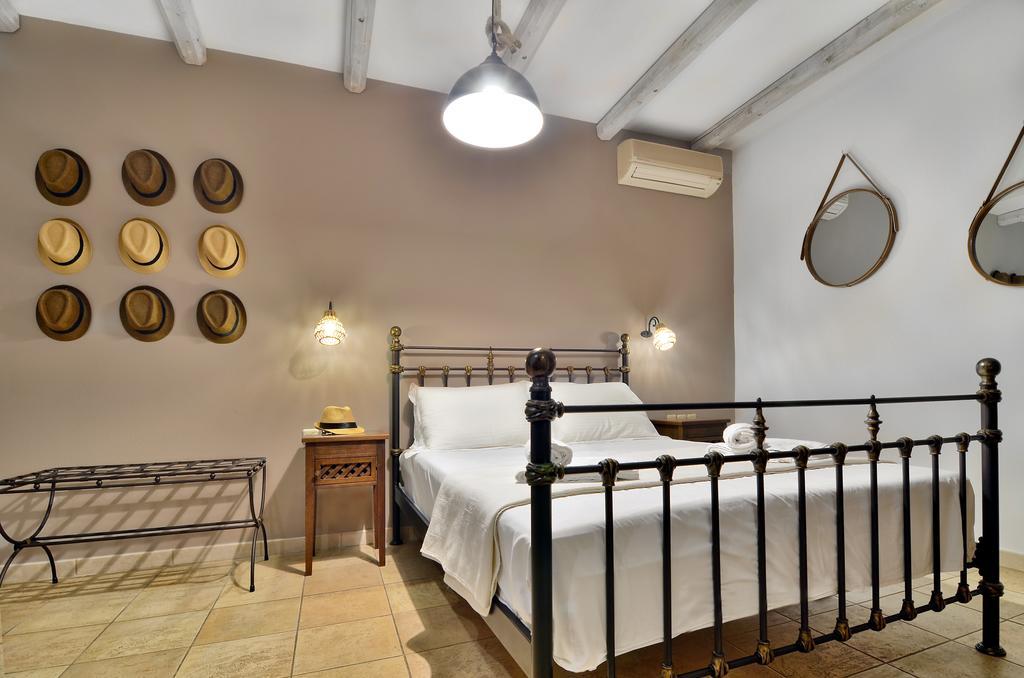 Niriides Luxury Apartments Сивота Номер фото